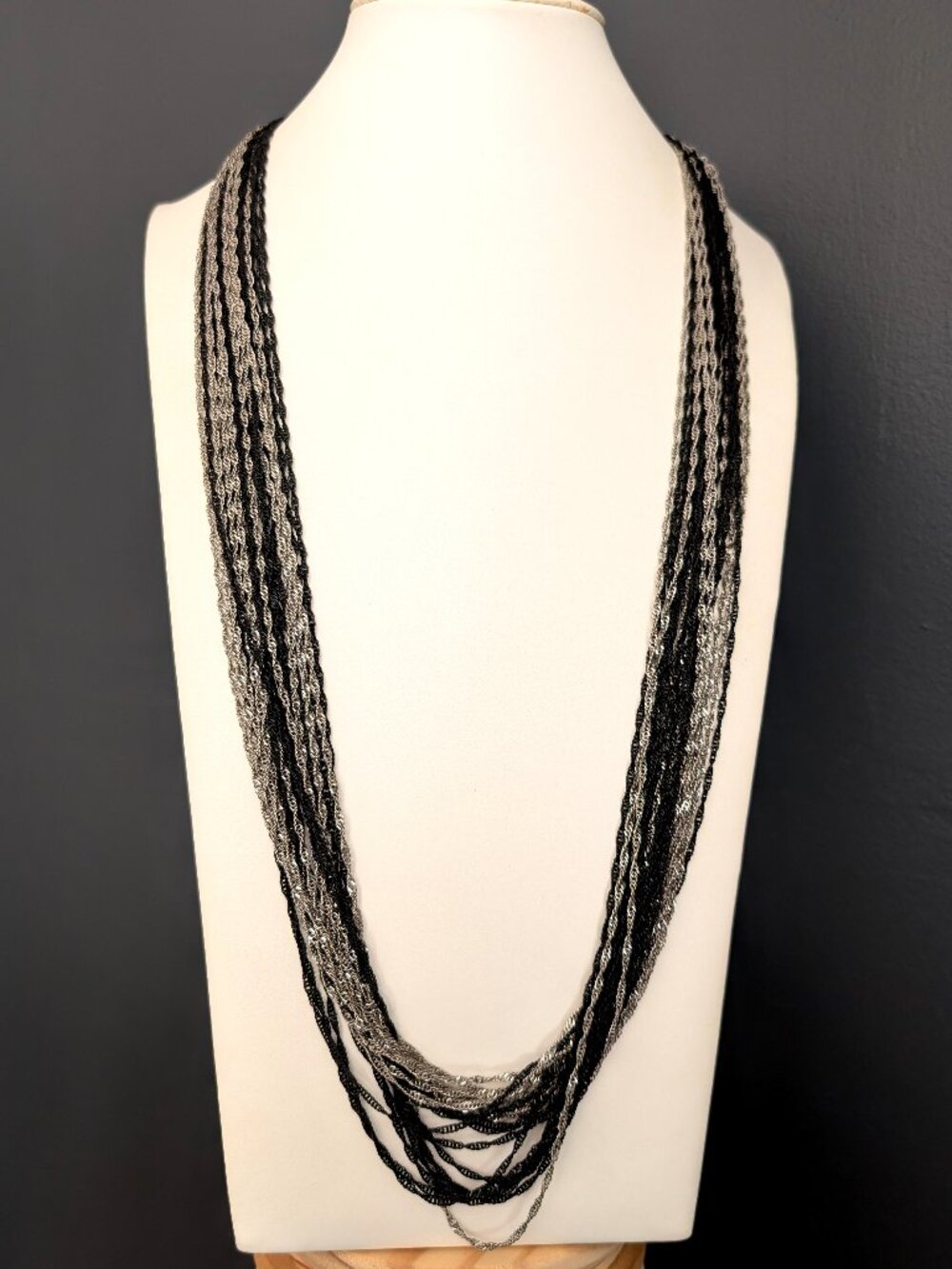 Multi strand black and silver chain layered necklace